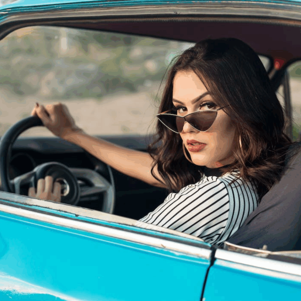 Woman in driver's seat of car